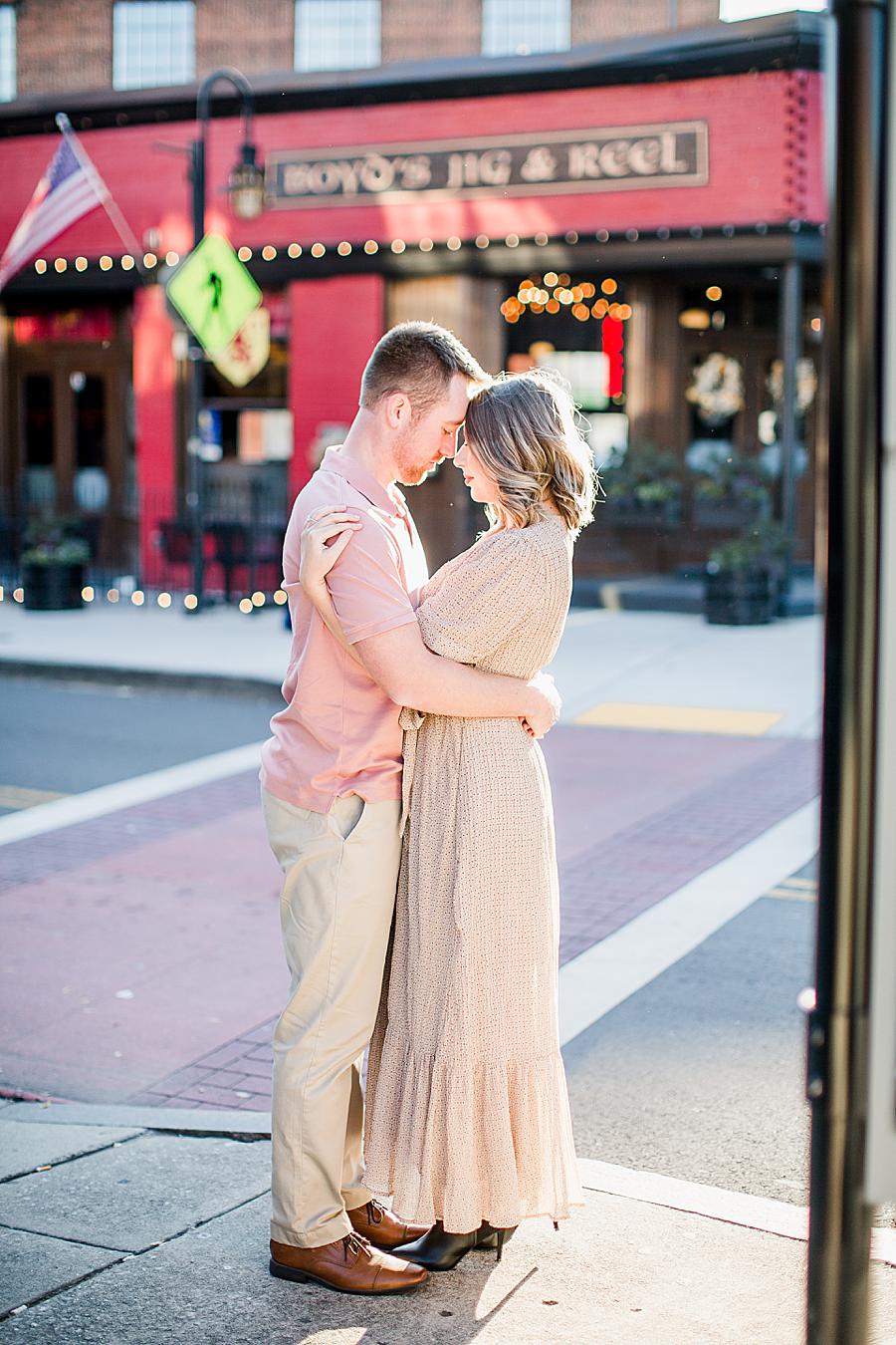 Arms around waist at this Knoxville engagement session by Knoxville Wedding Photographer, Amanda May Photos.