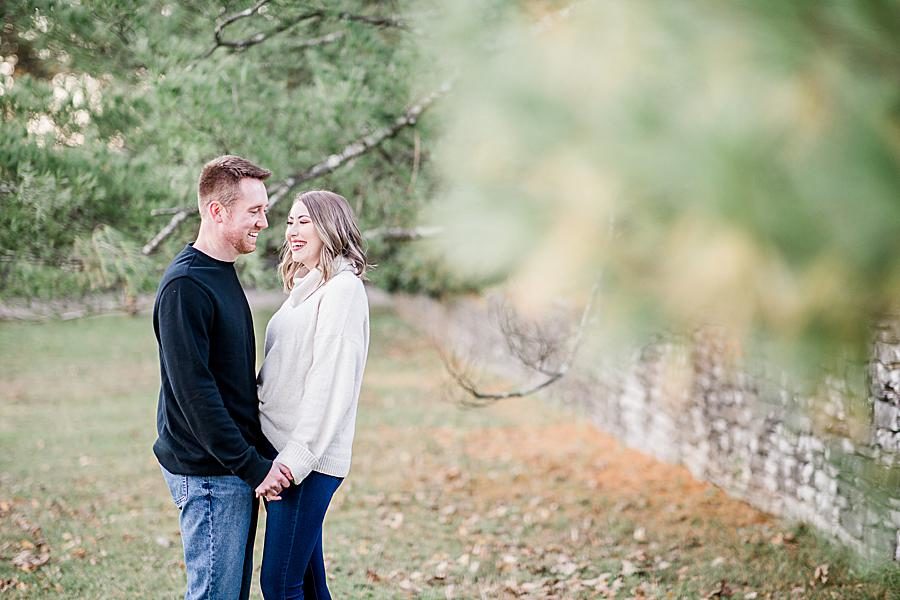 Through the leaves at this Knoxville engagement session by Knoxville Wedding Photographer, Amanda May Photos.