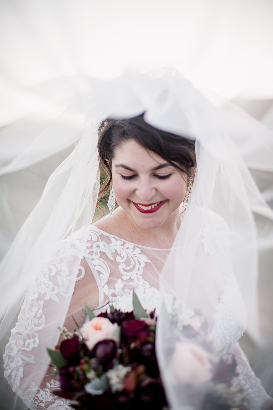 Looking at her under her veil at this bridal session at The Barn at High Point Farms by Knoxville Wedding Photographer, Amanda May Photos.