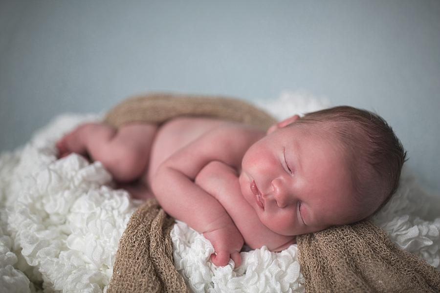 Arms crossed at this Studio Newborn Photos by Knoxville Wedding Photographer, Amanda May Photos.