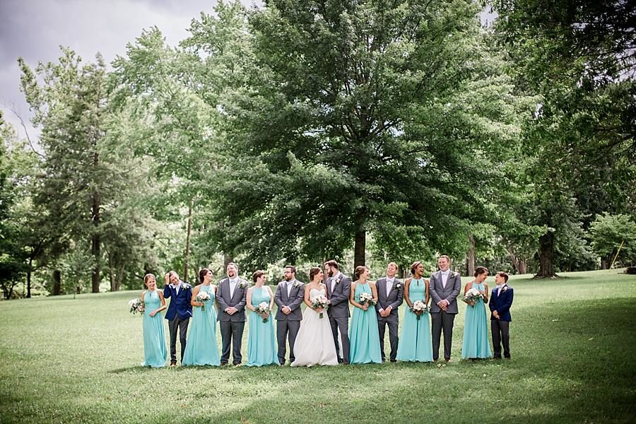 Bridal party by a tree at this Fountain City Church Wedding by Knoxville Wedding Photographer, Amanda May Photos.