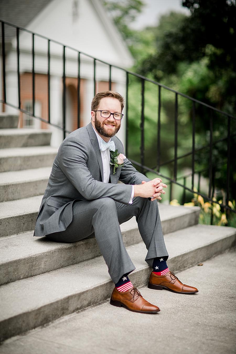 Sitting on the steps at this Fountain City Church Wedding by Knoxville Wedding Photographer, Amanda May Photos.