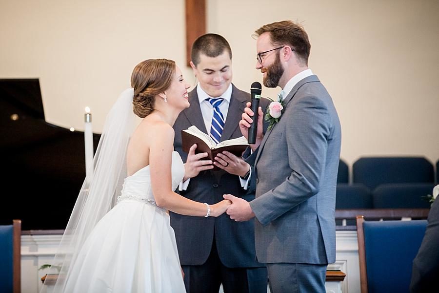 Exchanging vows at this Fountain City Church Wedding by Knoxville Wedding Photographer, Amanda May Photos.