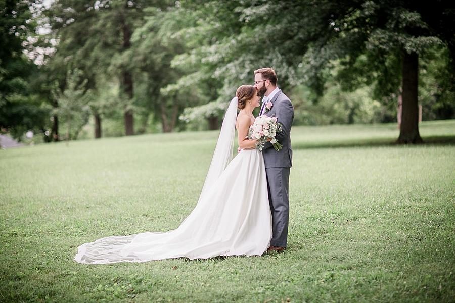 Forehead kisses at this Fountain City Church Wedding by Knoxville Wedding Photographer, Amanda May Photos.