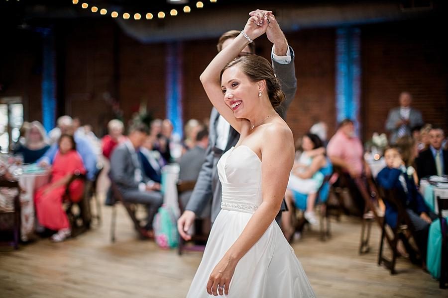 First dance twirl at this Fountain City Church Wedding by Knoxville Wedding Photographer, Amanda May Photos.