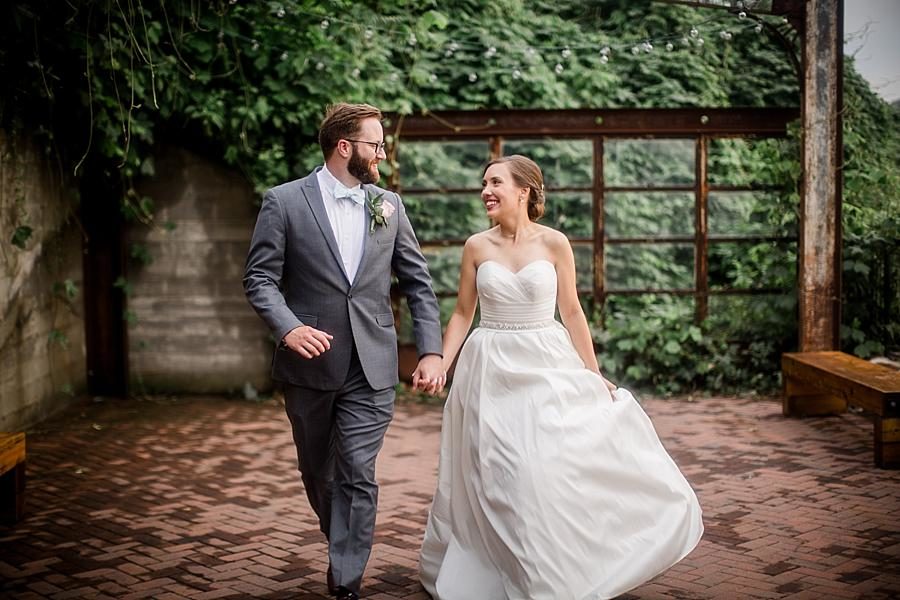 Walking towards the camera at this Fountain City Church Wedding by Knoxville Wedding Photographer, Amanda May Photos.