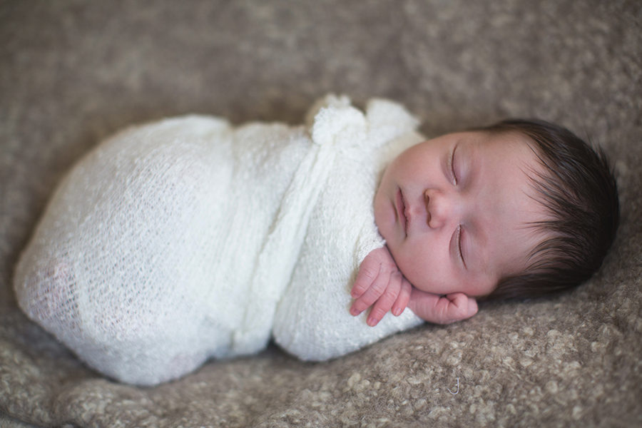 White swaddle at this Tullahoma, TN newborn session by Knoxville Wedding Photographer, Amanda May Photos.