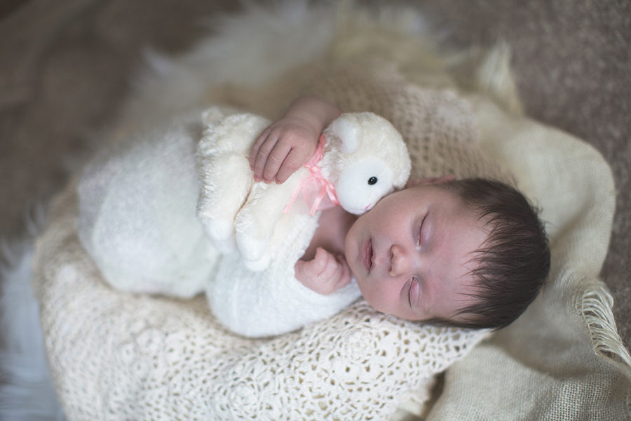 Hugging lamb at this Tullahoma, TN newborn session by Knoxville Wedding Photographer, Amanda May Photos.