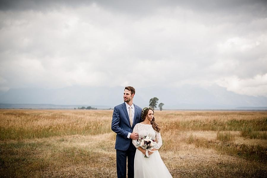 Looking in opposite directions at this Grand Tetons Destination Wedding by Knoxville Wedding Photographer, Amanda May Photos.