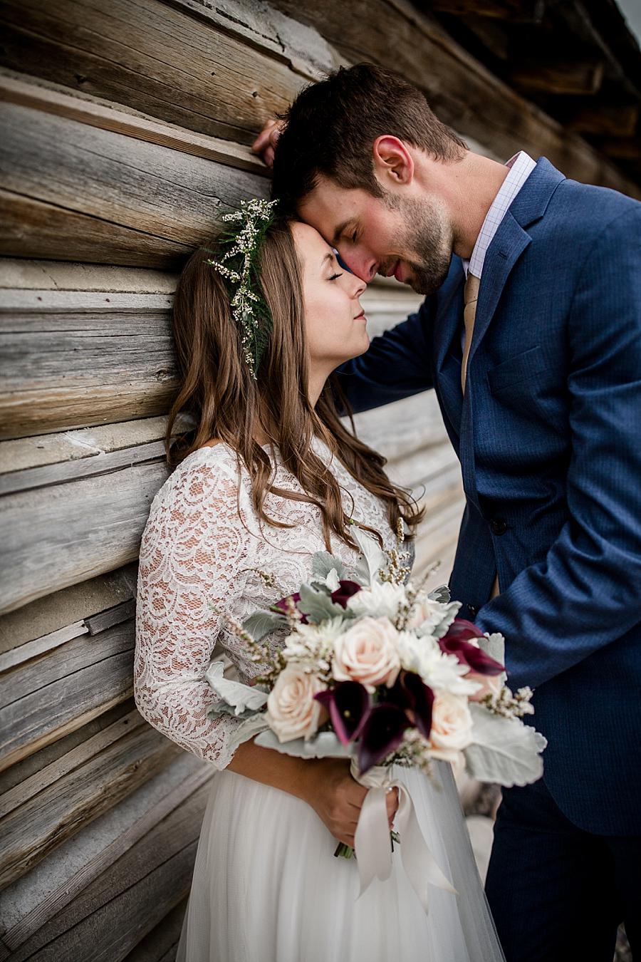 Back against cabin at this Grand Tetons Destination Wedding by Knoxville Wedding Photographer, Amanda May Photos.