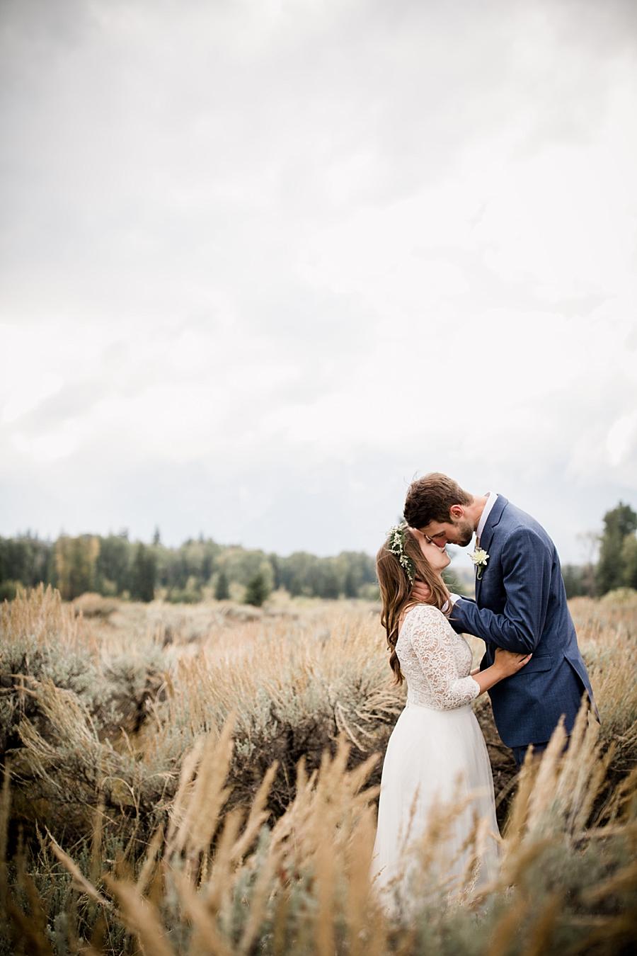 Looking down at her at this Grand Tetons Destination Wedding by Knoxville Wedding Photographer, Amanda May Photos.