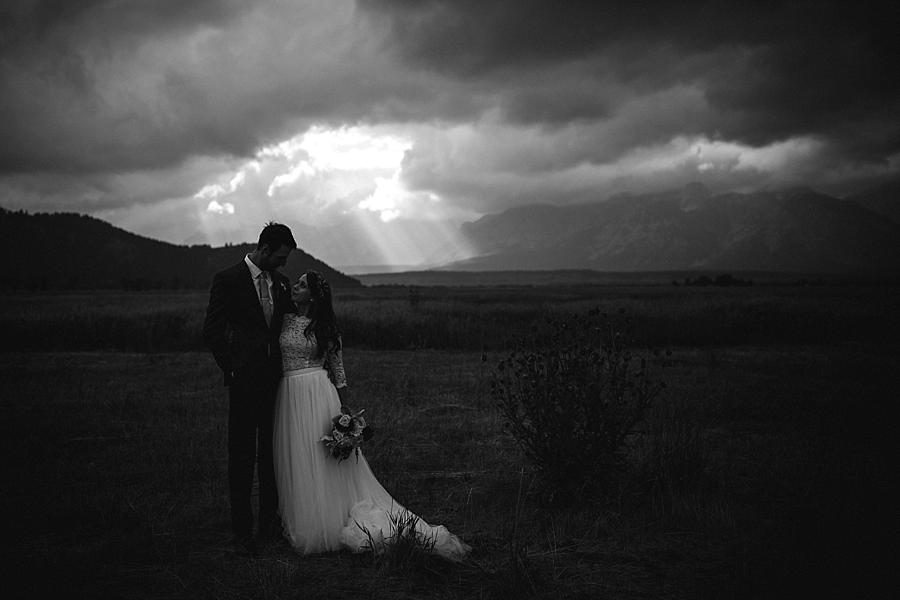 Kissing infront of landscape at this Grand Tetons Destination Wedding by Knoxville Wedding Photographer, Amanda May Photos.