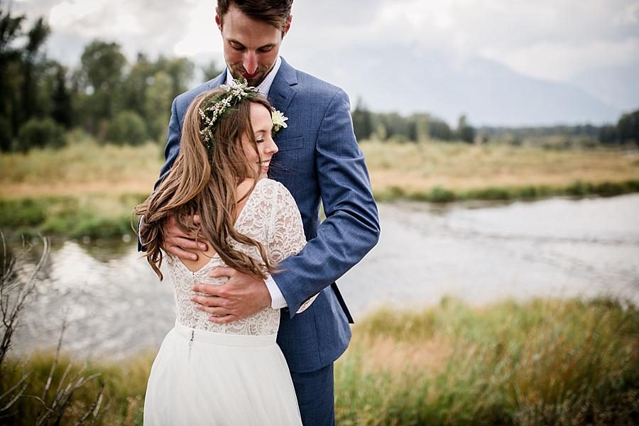 Hugging each other at this Grand Tetons Destination Wedding by Knoxville Wedding Photographer, Amanda May Photos.