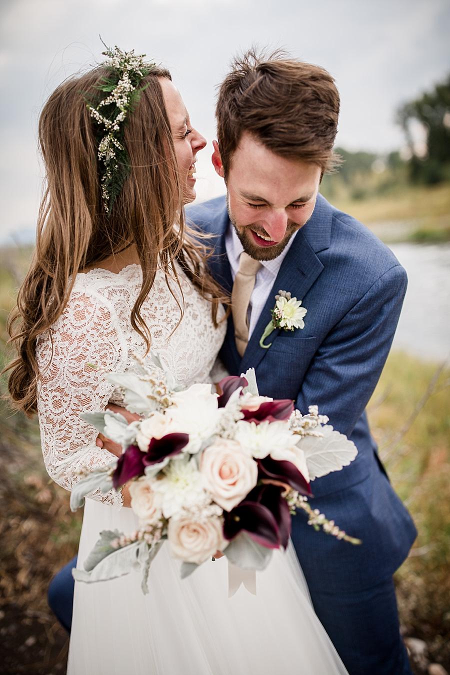 Laughing with each other at this Grand Tetons Destination Wedding by Knoxville Wedding Photographer, Amanda May Photos.