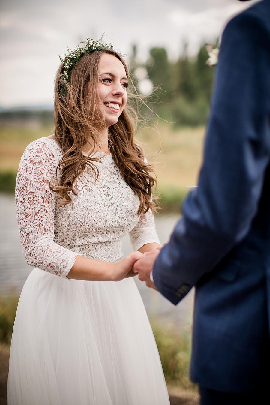 Holding hands smiling at this Grand Tetons Destination Wedding by Knoxville Wedding Photographer, Amanda May Photos.