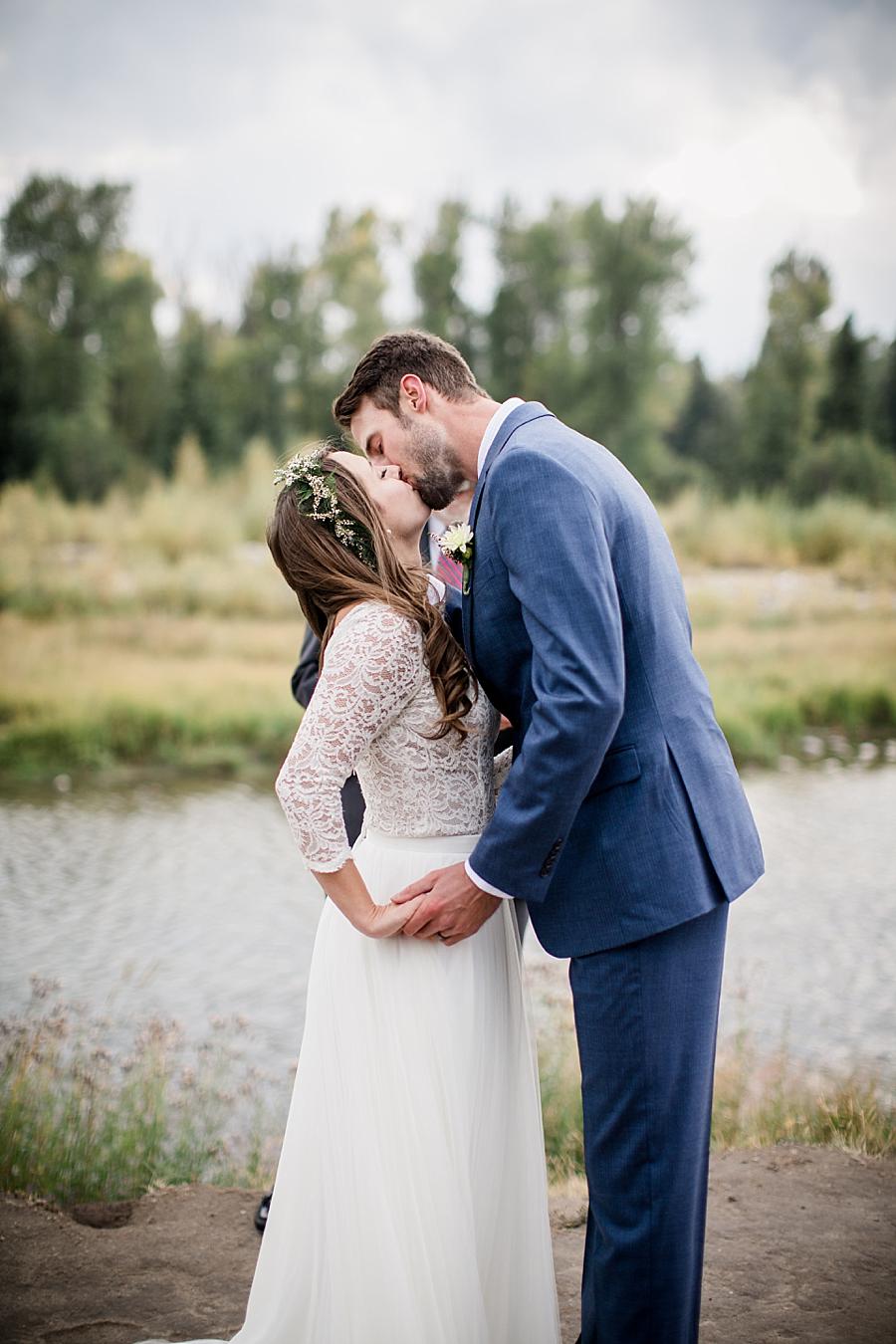 First kiss at this Grand Tetons Destination Wedding by Knoxville Wedding Photographer, Amanda May Photos.