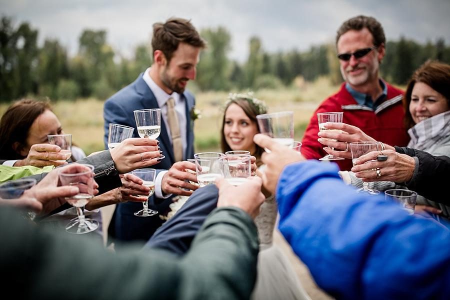 Toasting with guests at this Grand Tetons Destination Wedding by Knoxville Wedding Photographer, Amanda May Photos.