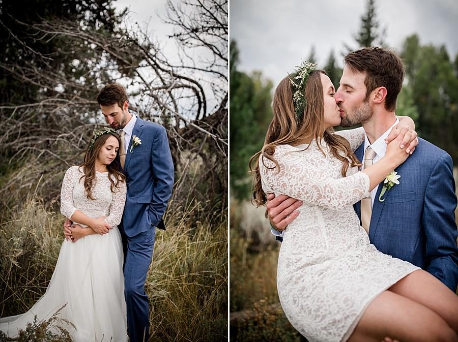 Holding her up and kissing her at this Grand Tetons Destination Wedding by Knoxville Wedding Photographer, Amanda May Photos.