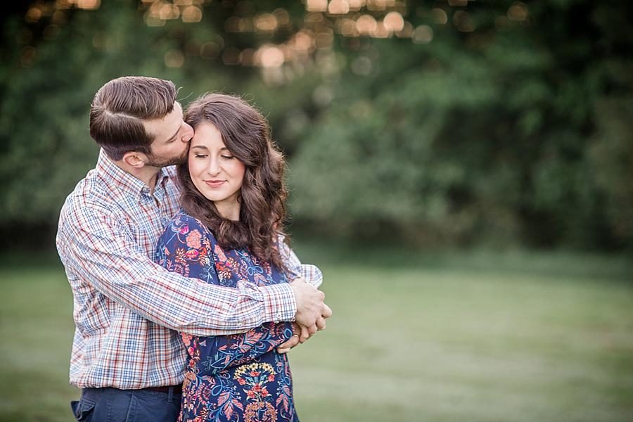 Temple kiss at this Shelby Bottoms Park family session by Knoxville Wedding Photographer, Amanda May Photos.