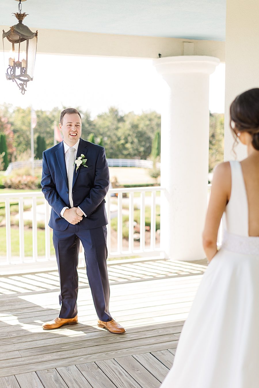 Groom seeing bride for the first time at this fall castleton farms wedding