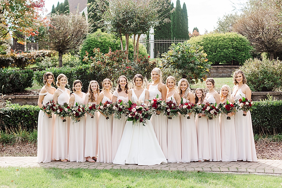 Pink bridesmaid dresses at this fall castleton farms wedding