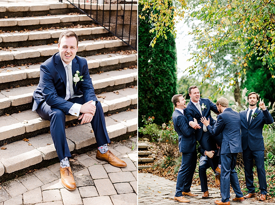 Groom sitting on steps at this fall castleton farms wedding