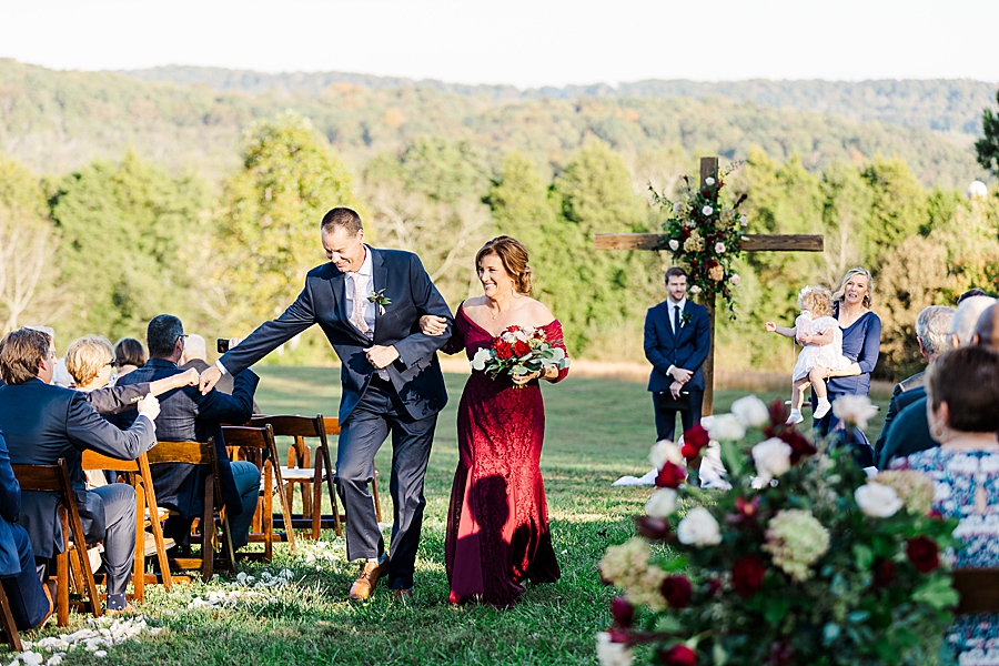 Parents of the bride at this fall castleton farms wedding