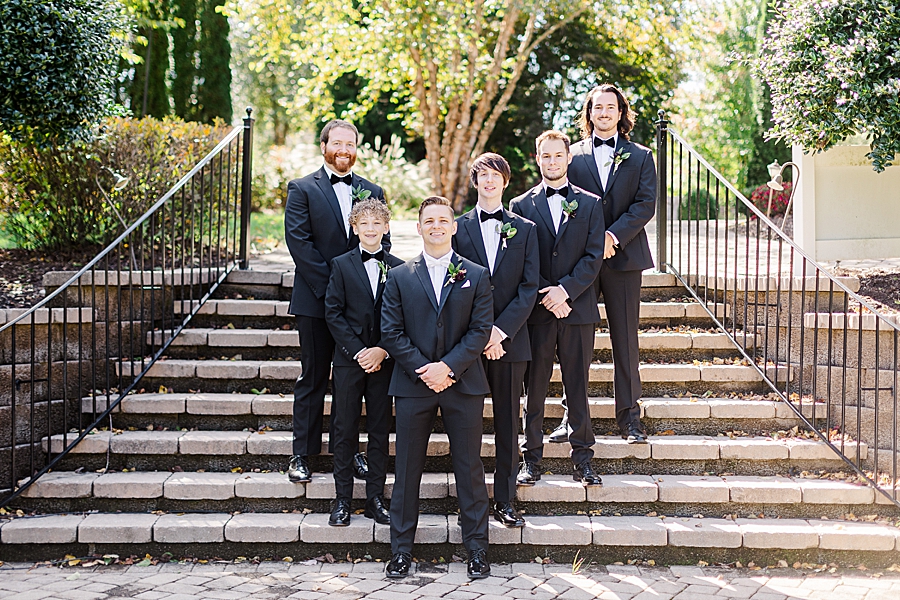 groom and groomsmen at this fall wedding at castleton farms