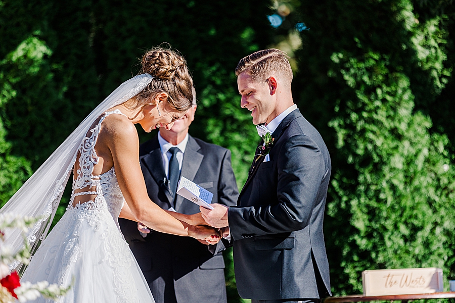 exchanging vows at this fall wedding at castleton farms