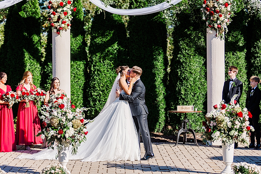 you may kiss the bride at this fall wedding at castleton farms