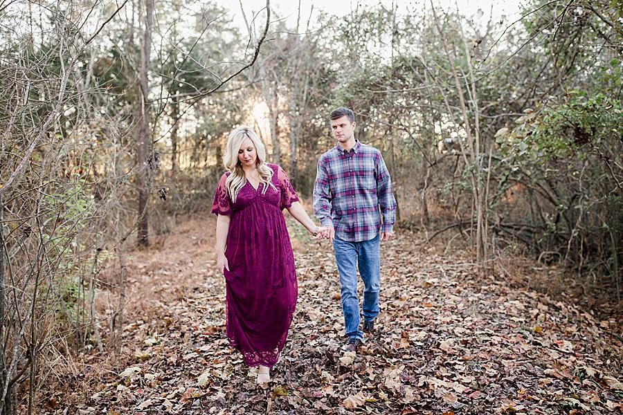 Walking at this farm maternity session by Knoxville Wedding Photographer, Amanda May Photos.