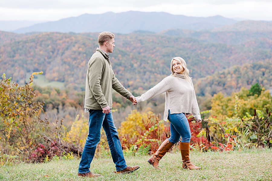 walking hand in hand at this foothills parkway engagement