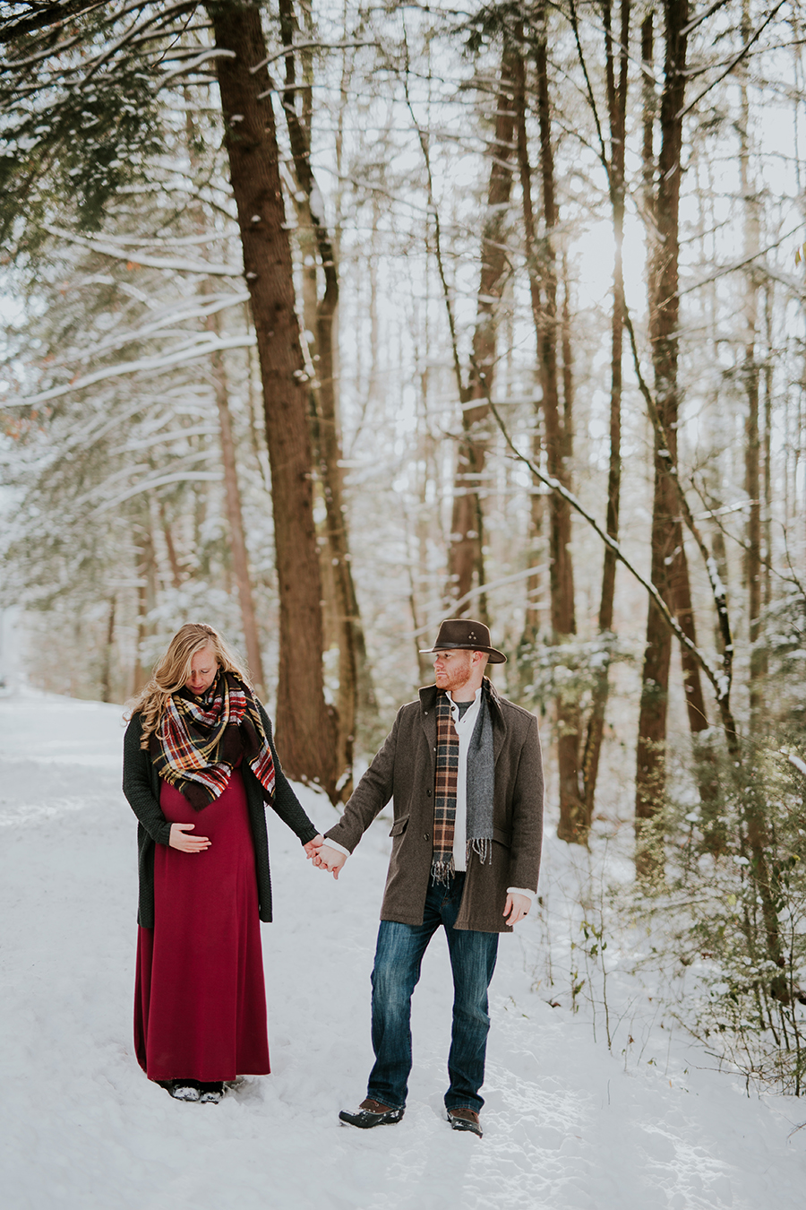  Knoxville, TN Smoky Mountain maternity photos, holding hands with space.