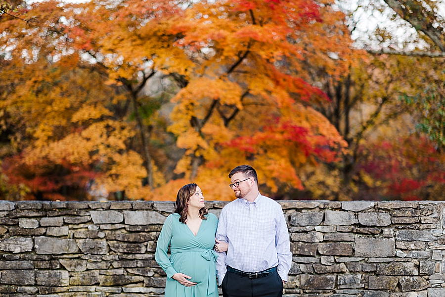 pregnant couple at their golden knoxville botanical maternity session