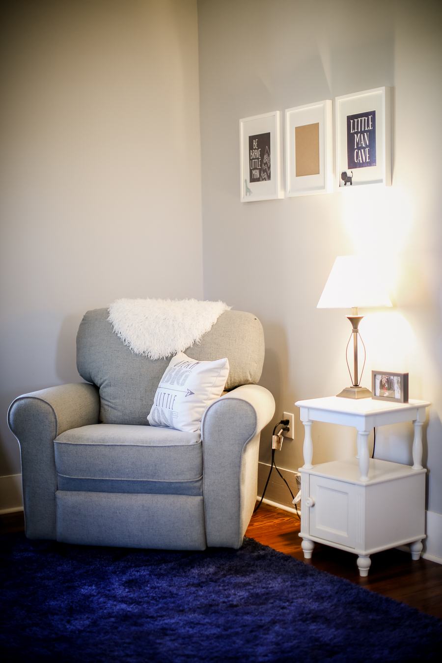 Glider and side table in the nursery by Knoxville Wedding Photographer, Amanda May Photos.