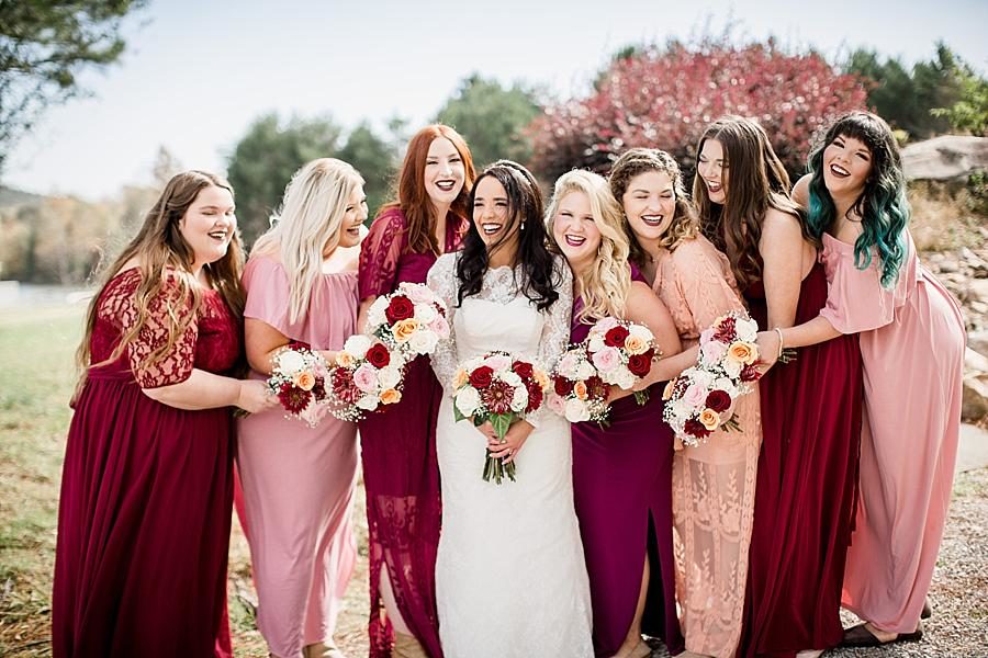 Cranberry dresses at this Toqua Campground Wedding by Knoxville Wedding Photographer, Amanda May Photos.