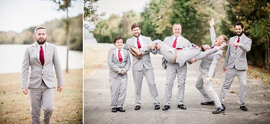Holding the groom at this Toqua Campground Wedding by Knoxville Wedding Photographer, Amanda May Photos.