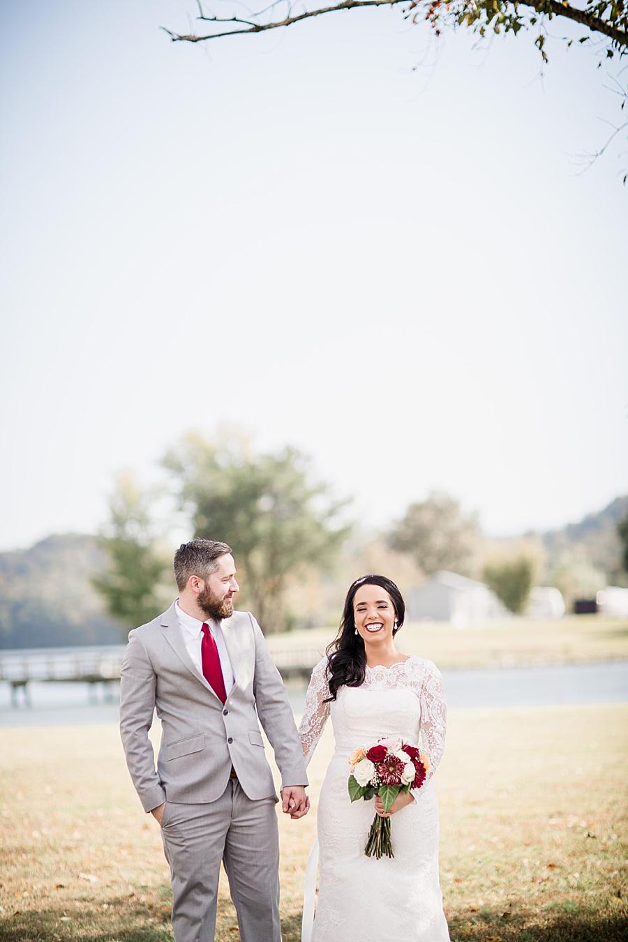 All smiles at this Toqua Campground Wedding by Knoxville Wedding Photographer, Amanda May Photos.