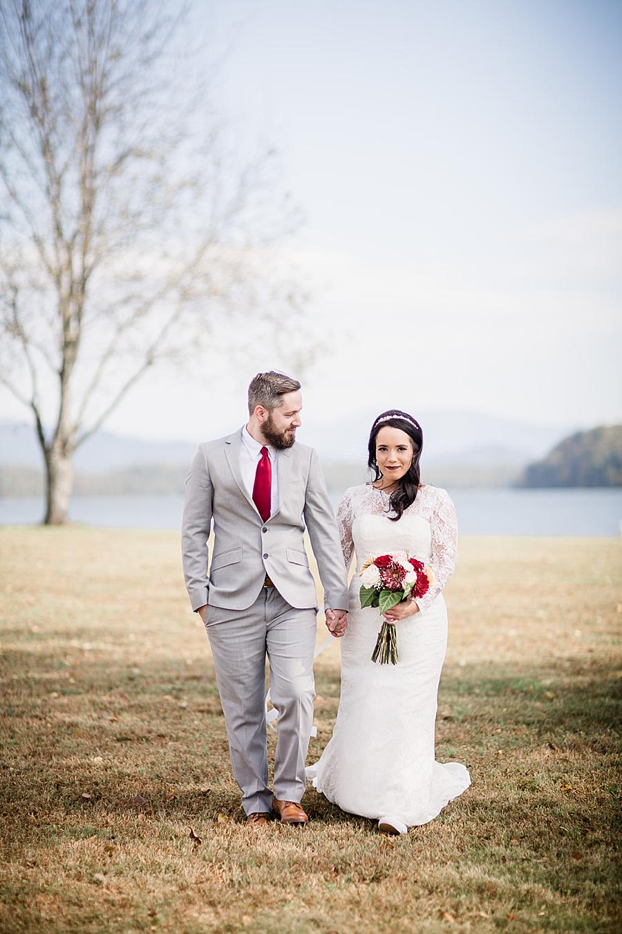 Looking at his bride at this Toqua Campground Wedding by Knoxville Wedding Photographer, Amanda May Photos.