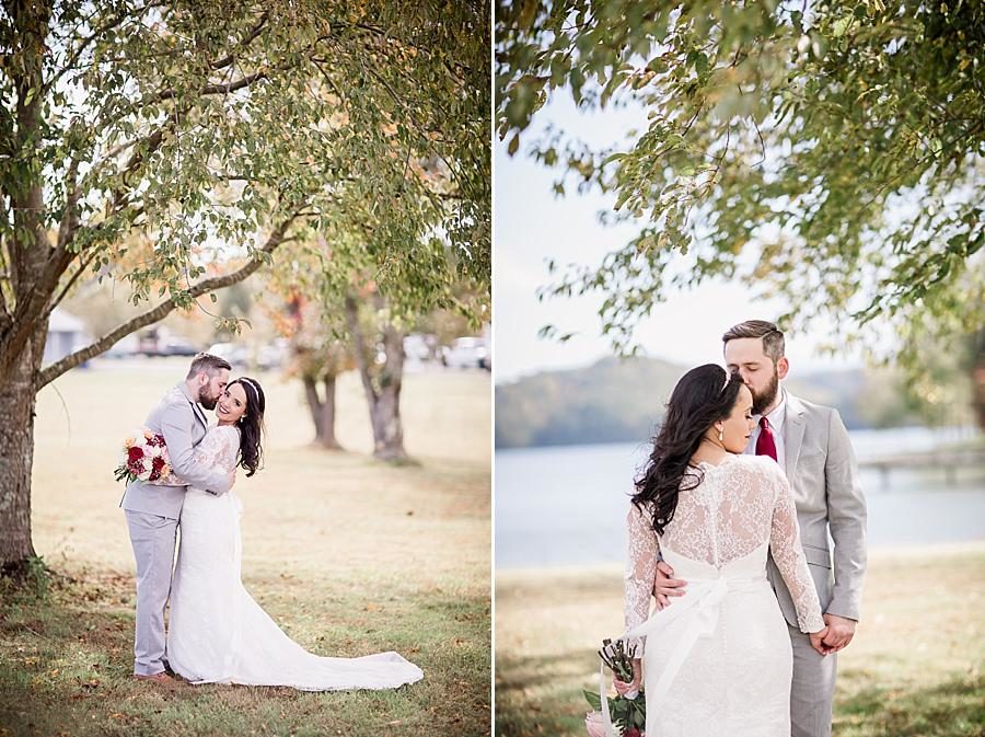Under the trees at this Toqua Campground Wedding by Knoxville Wedding Photographer, Amanda May Photos.