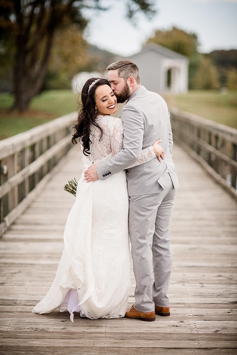Sweet kisses at this Toqua Campground Wedding by Knoxville Wedding Photographer, Amanda May Photos.
