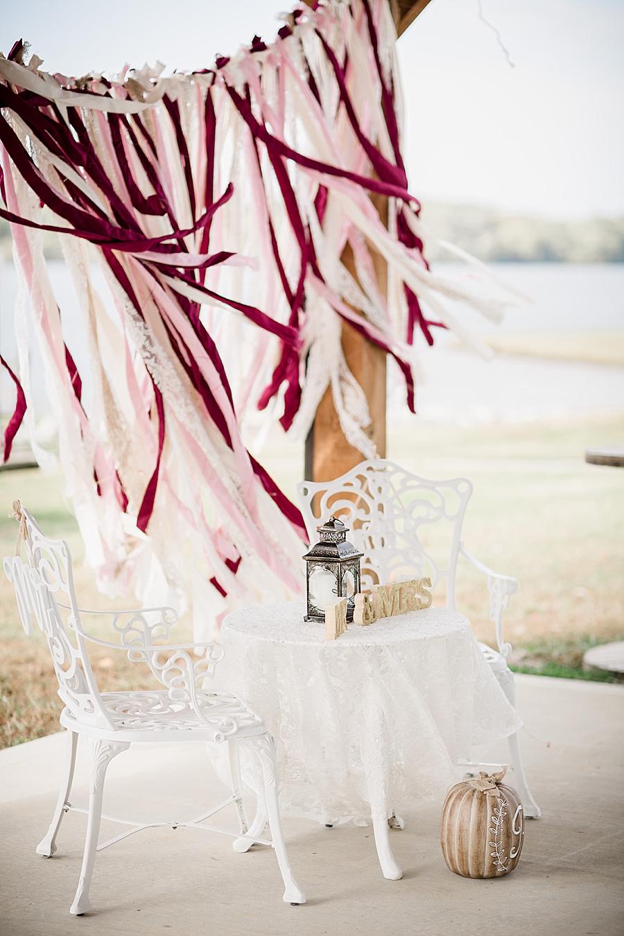The head table at this Toqua Campground Wedding by Knoxville Wedding Photographer, Amanda May Photos.