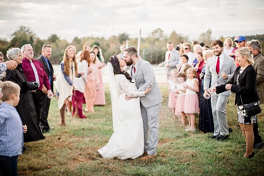 Goodbye kiss at this Toqua Campground Wedding by Knoxville Wedding Photographer, Amanda May Photos.