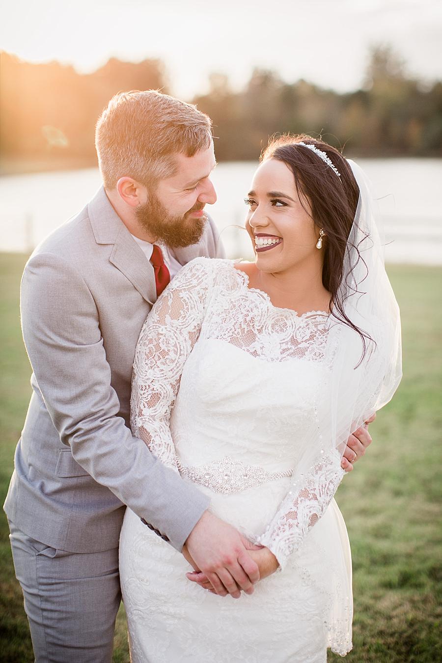 Warm lighting at this Toqua Campground Wedding by Knoxville Wedding Photographer, Amanda May Photos.