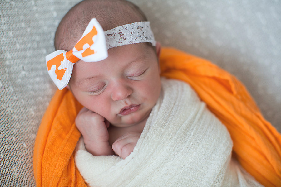 UT bow on her head at this American Flag newborn session by Knoxville Wedding Photographer, Amanda May Photos.