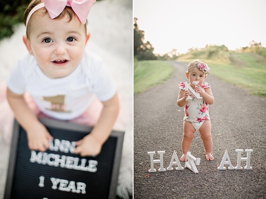 Holding letters at this Melton Lake Park One Year Session by Knoxville Wedding Photographer, Amanda May Photos.