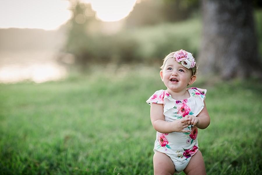 Floral onesie at this Melton Lake Park One Year Session by Knoxville Wedding Photographer, Amanda May Photos.
