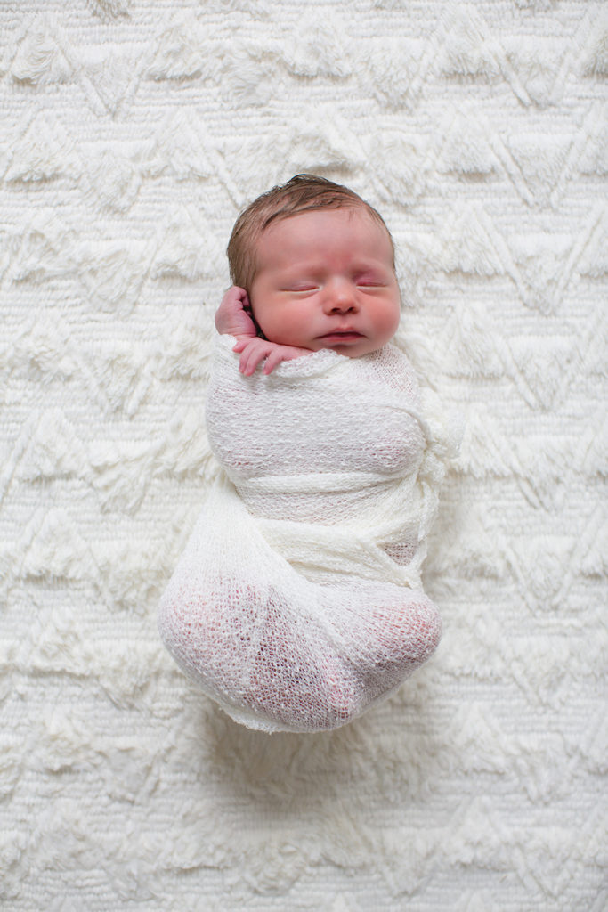 White swaddle on newborn at this newborn session by Knoxville Wedding Photographer, Amanda May Photos.