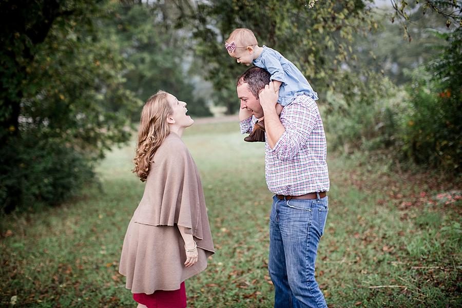 On dad's shoulders at this Melton Hill Park Sunrise Session by Knoxville Wedding Photographer, Amanda May Photos.