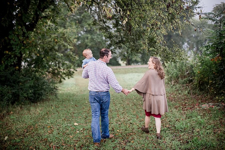 Holding hands at this Melton Hill Park Sunrise Session by Knoxville Wedding Photographer, Amanda May Photos.